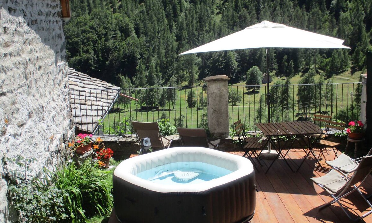 Ala di Stura Cabin | Baite del Baus—Baita d'là Cravià, a renovated old barn with a garden.