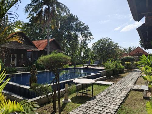 Sampalan Hotel | Belvilla near Sampalan Beach formerly Arjuna Bungalow