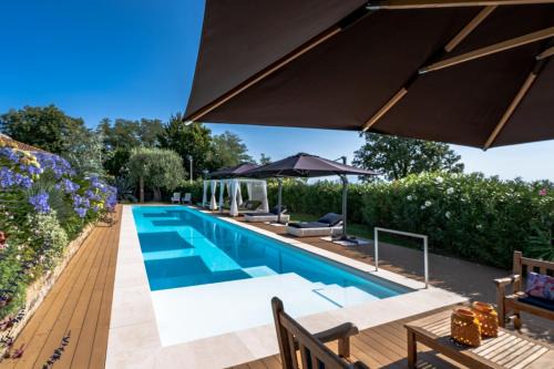 Soiano del Lago Villa | Charming Green and Blue Villa by Wonderful Italy