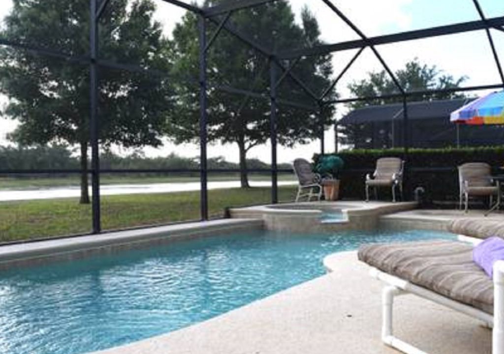 Sunrise Lakes Villa | Charming water view villa with swimming pool, spa and next to the Disney Parks