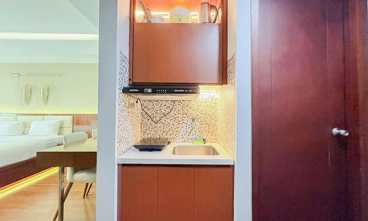 Ngaglik Apartment | Classic Wooden Touch Studio Room At Apartment Mataram City