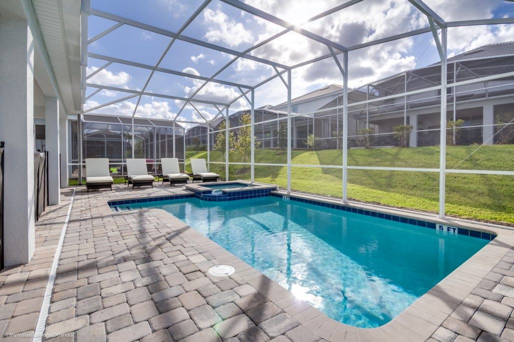 Davenport Villa | Dreamy 8 Bedroom 5 Bathroom Champions Gate Resort Property with Spa and Pool