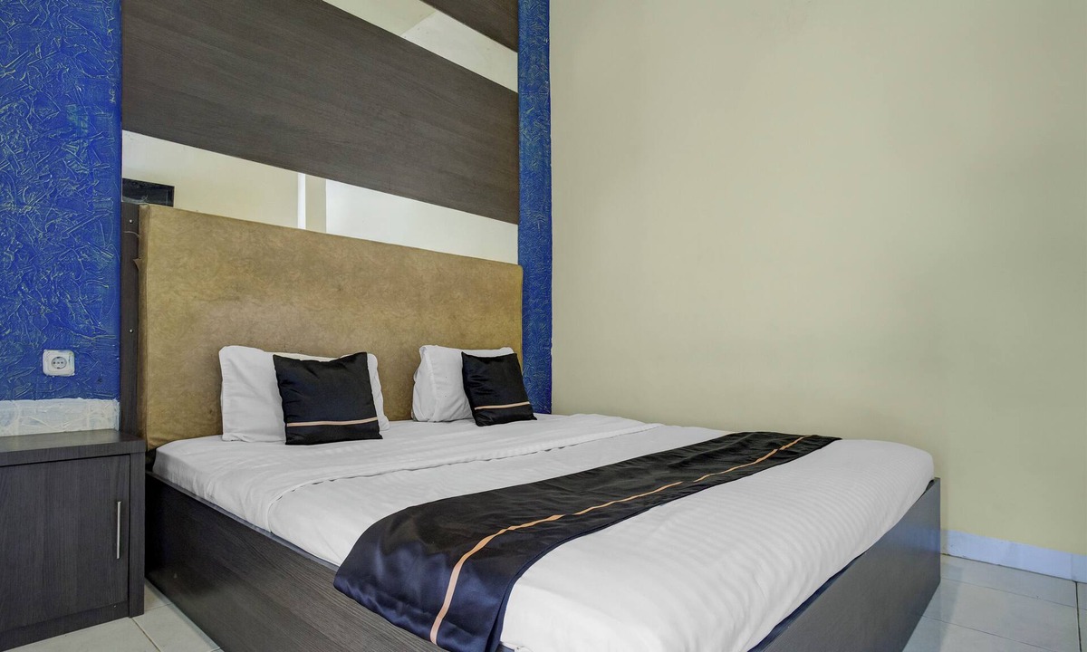 Palembang Hotel | Hotel O near Universitas Widya Dharma