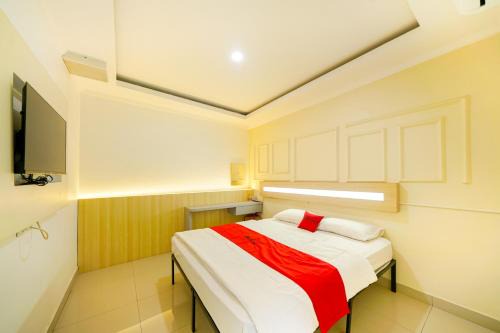 Karawang Timur Hotel | JM Tuparev Mitra RedDoorz