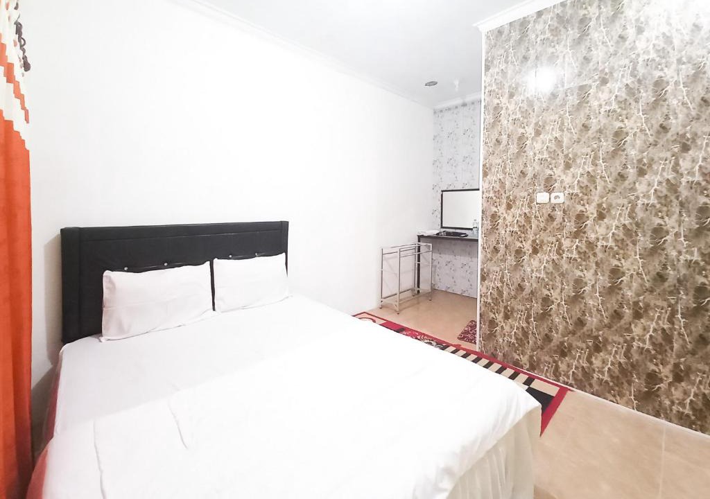Oro Oro Ombo Hotel | Lancar Homestay Syariah near BNS Mitra RedDoorz