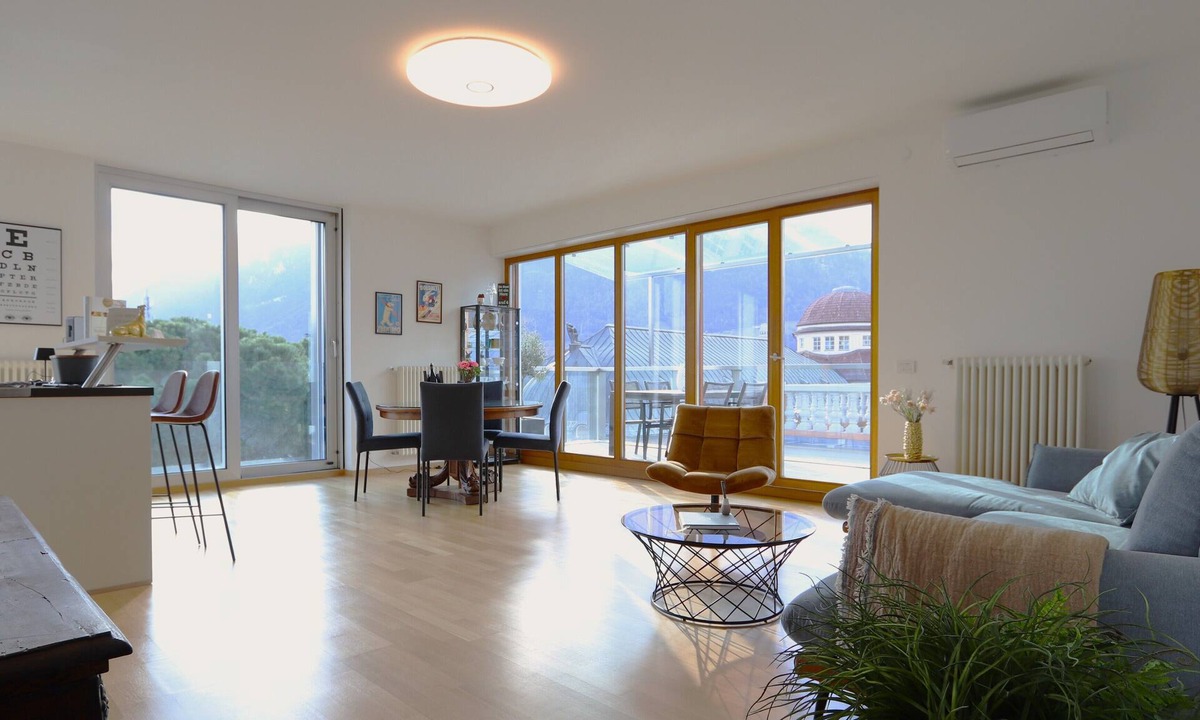 Merano Apartment | Merano center penthouse with terrace, garage, bike room and infrared sauna.