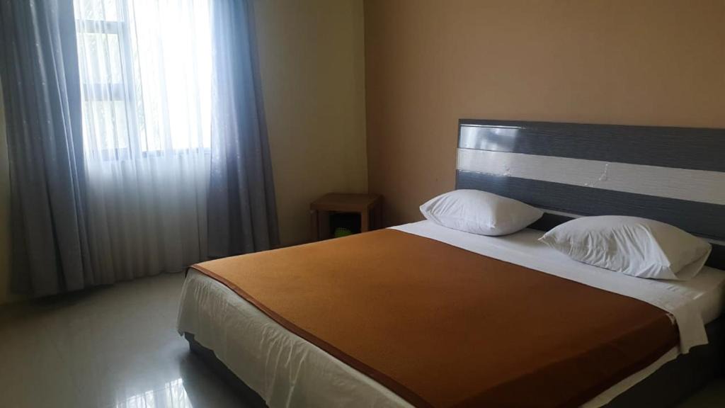 Balikpapan Hotel | OYO 91266 Markoni 18 Guest House