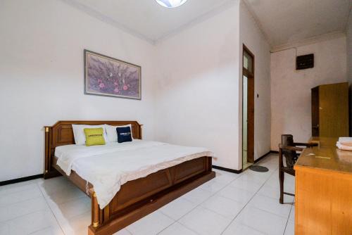 Oro Oro Ombo Hotel | Palereman Hotel RedPartner near Jatim Park 1