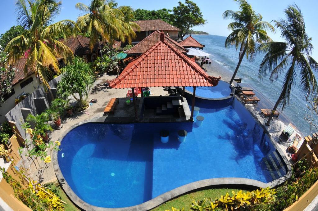 Tulamben Resort | Paradise Palm Beach Bungalows and Dive Center