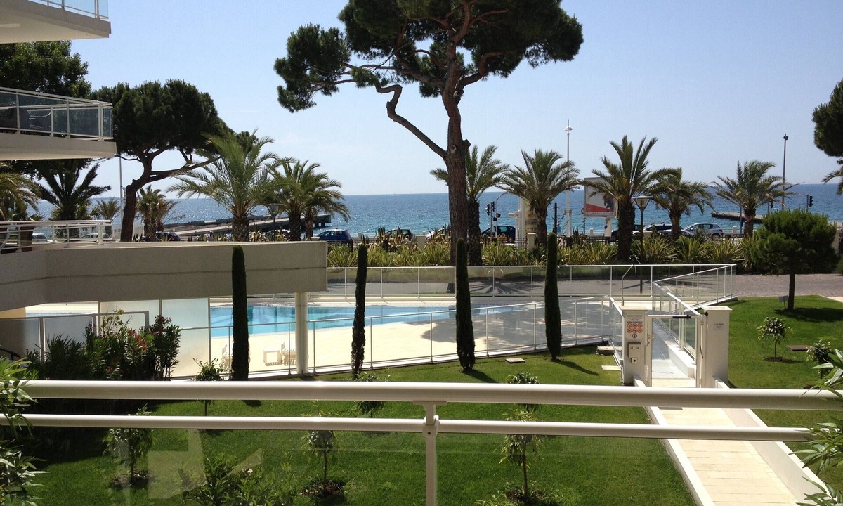 La Bocca Apartment | Royal palm with swimming pools: Apartment with terrace, sea and garden view