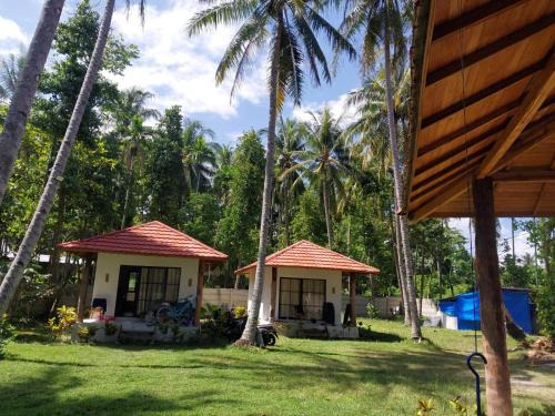 Krui Hotel | Slab Krui Bungalows