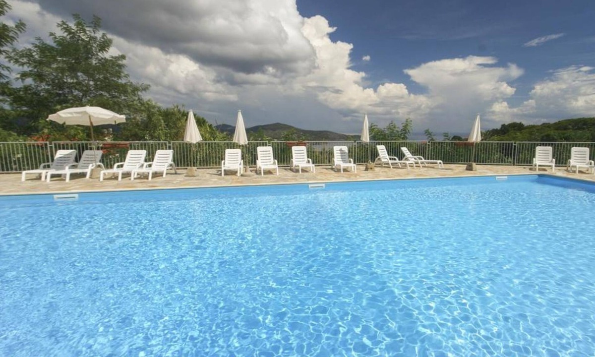 Capoliveri Apartment | Studio Apartment 'Mono Le Lecce 2' with Mountain View, Pool & Balcony
