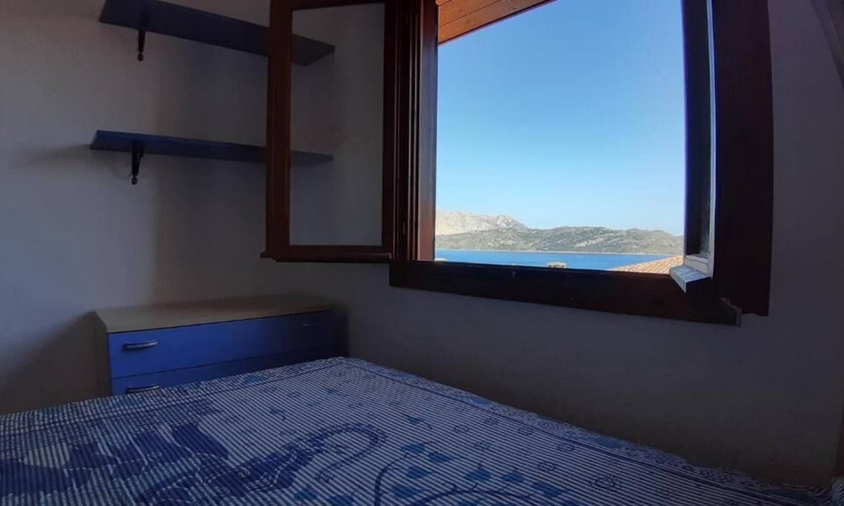 Capo Coda Cavallo Apartment | Three-room apartment