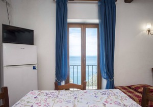 2 room9 in Residence La Scogliera on the East Coast, near the beach of Cala Seregola