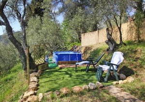 Holiday home with above-ground pool and sea view in Monteggiori