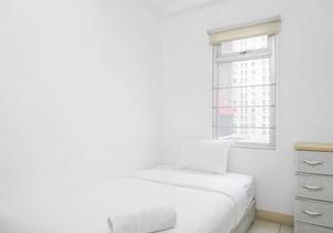 Spacious 2BR Green Bay Pluit Apartment By Travelio