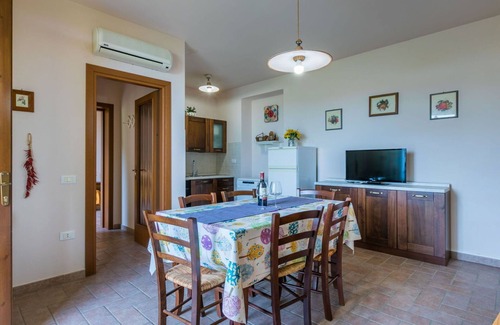 Castellina Marittima Apartment | Cosy apartment for 7 guests with A/C, pool, WIFI, TV, patio, pets allowed and panoramic view