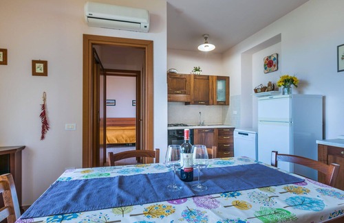 Castellina Marittima Apartment | Cosy apartment for 7 guests with A/C, pool, WIFI, TV, patio, pets allowed and panoramic view