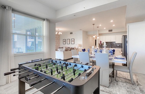 Kissimmee Condo | Modern Condo 5mi to Disney, Foosball, Giant Water Slide, Free Water Park