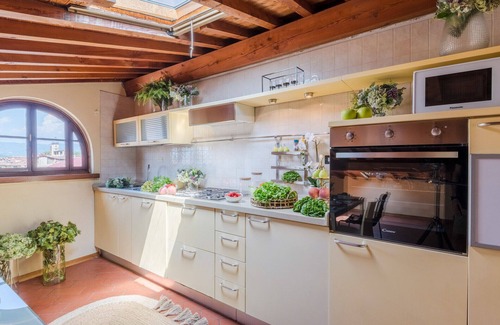 Lucca Historical Center Apartment | Panoramic penthouse with views and elevator in Lucca