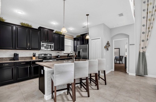 Bay Lake House | 9008 Paradise Palms Blissful Haven: 5-Bed Oasis of Luxury and Tranquility
