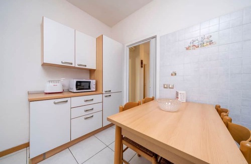 Colugna Apartment | A comfortable and welcoming 60 square meters apartment, perfect for four people, located on the fourth floor of a period building without an elevator.The property is located in a quiet area, allowing our guests to easily and quickly reach the center of U
