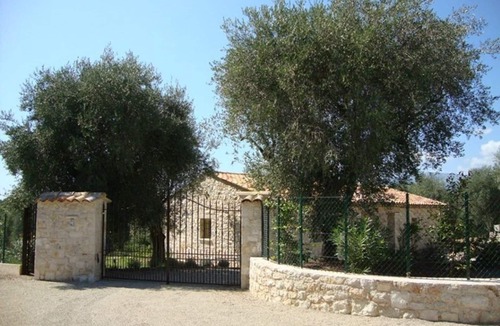 Les Maillans House | A stone farmhouse in the countryside surrounded by olive trees