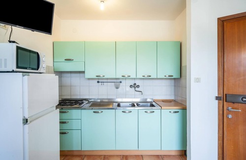 Bibione Apartment | Apartment "Condominio Villa Silente Terrazza" Near the Beach with Wi-Fi, A/C & Terrace
