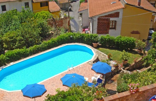 Massarosa House | Apartment in villa with pool, internet, TV, terrace, panoramic view, parking, close to Viareggio