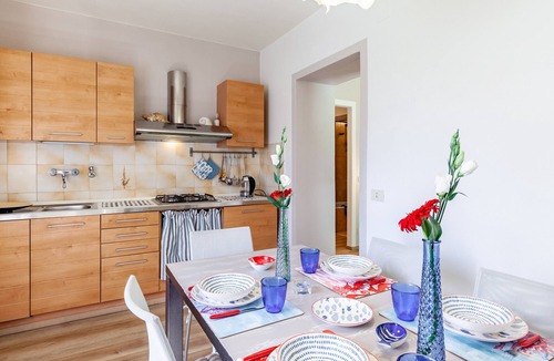 Lido di Camaiore Apartment | Apartment 'La Casa Rossa Versilia' with Mountain View, Shared Garden and Wi-Fi