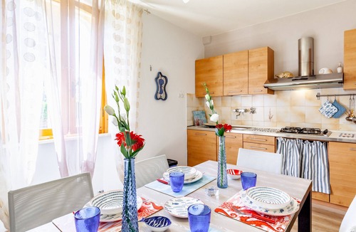 Lido di Camaiore Apartment | Apartment 'La Casa Rossa Versilia' with Mountain View, Shared Garden and Wi-Fi