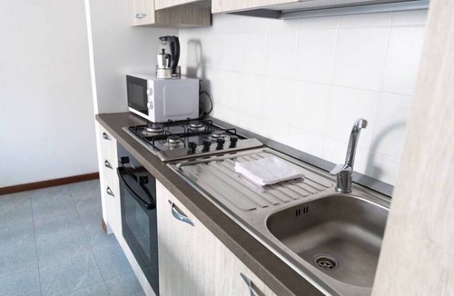 Bellano Apartment | Apartment on the beach facing Lake Como. Air conditioning, wifi, internal parking and beach access are free!The house is located right in front of the lake, from where you can enjoy the beautiful view of the lake. Bellano center and Bellano Tartavalle Te