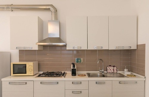 San Vincenzo Apartment | Apartment 'Villa Corallo - Agata' with Shared Garden, Wi-Fi and Air Conditioning