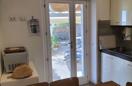 Pomonte Apartment | Apartment with exclusive garden and seaview in Pomonte, 50 meters from the sea