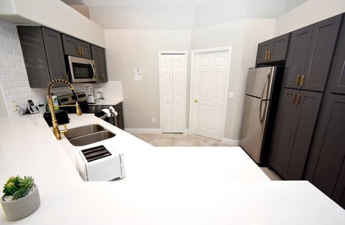 Greater Groves House | Beautiful Family Home near Disney! Completely Renovated! Private Pool & Jacuzzi!