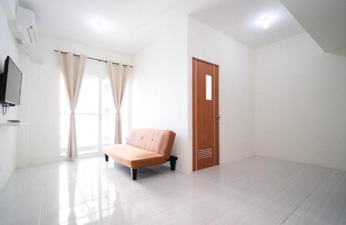 Surabaya Apartment | Best Choice and Homey 2BR at Puncak Dharmahusada Apartment By Travelio