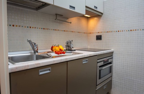 Lesa Apartment | Blue Horizon - pools, terrace and lakes view