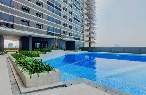 Panunggangan Utara Apartment | Bright And Cozy 1Br At Collins Boulevard Apartment