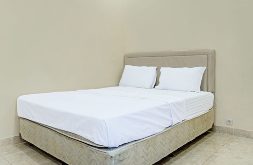 South Ogan Komering Ulu Hotel | Capital O 92316 Wisma Widya Loka Pratama Near Futsal Tebing Gading