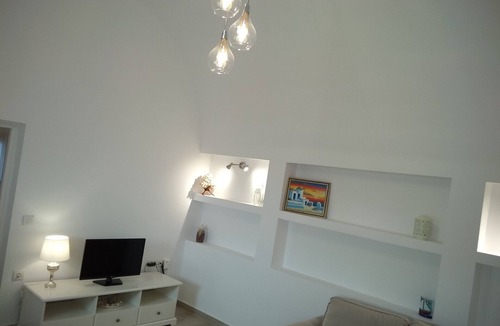 Oia House | casa sigala arch