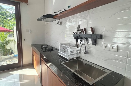 Kutuh Villa | Charming 1 bedroom private pool villa, living room and kitchen in southern Bali