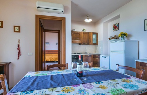 Castellina Marittima Apartment | Cosy apartment for 7 guests with A/C, pool, WIFI, TV, patio, pets allowed and panoramic view