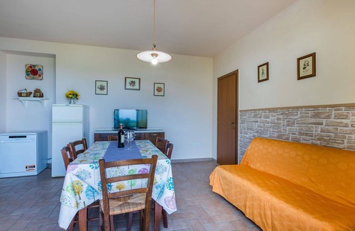Castellina Marittima Apartment | Cosy apartment for 7 guests with A/C, pool, WIFI, TV, patio, pets allowed and panoramic view