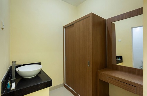 Denpasar Barat House | Cozy co-living that has two buildings separated by a pool to cool down and relax
