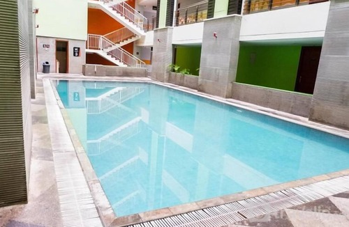 Siwalankerto Apartment | Cozy Living 2Br Apartment At High Point Serviced