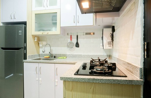 Pondokcina Apartment | Cozy Minimalist 2BR with City View at Atlanta Apartment