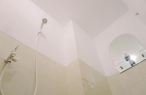 South Tangerang Apartment | Cozy Stay Studio at Urbantown Serpong Apartment By Travelio