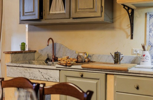 Sant'Andrea di Compito Villa | Dimora delle Camelie, a traditional stylish stone farmhouse with garden on the hills of Compitese between Lucca and Pisa