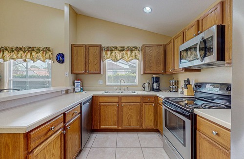 Lake Wilson Preserve House | Dog-friendly home with private pool, central AC, W/D & grill