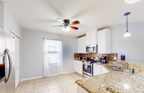 Cypress Pointe House | Dog-friendly home with pool, spa, screened patio, themed bedrooms, & W/D